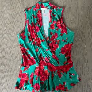 Deep green peplum top with bright red roses size: XS